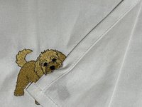 Playful Goldendoodle Tea Towel Thief
